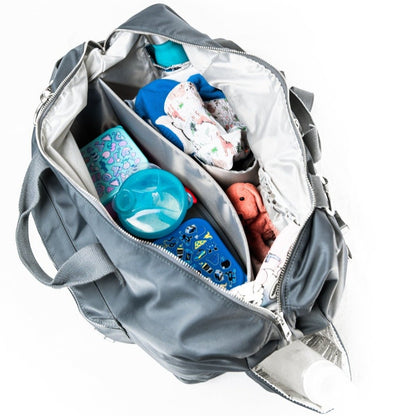alt="inside The DUFFLE Nappy Bag packed"